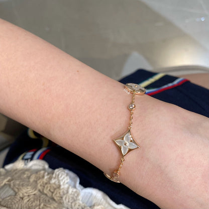 [Bloom]STAR AND SUN 4 MOTIF WHITE MOP PINK GOLD BRACELET